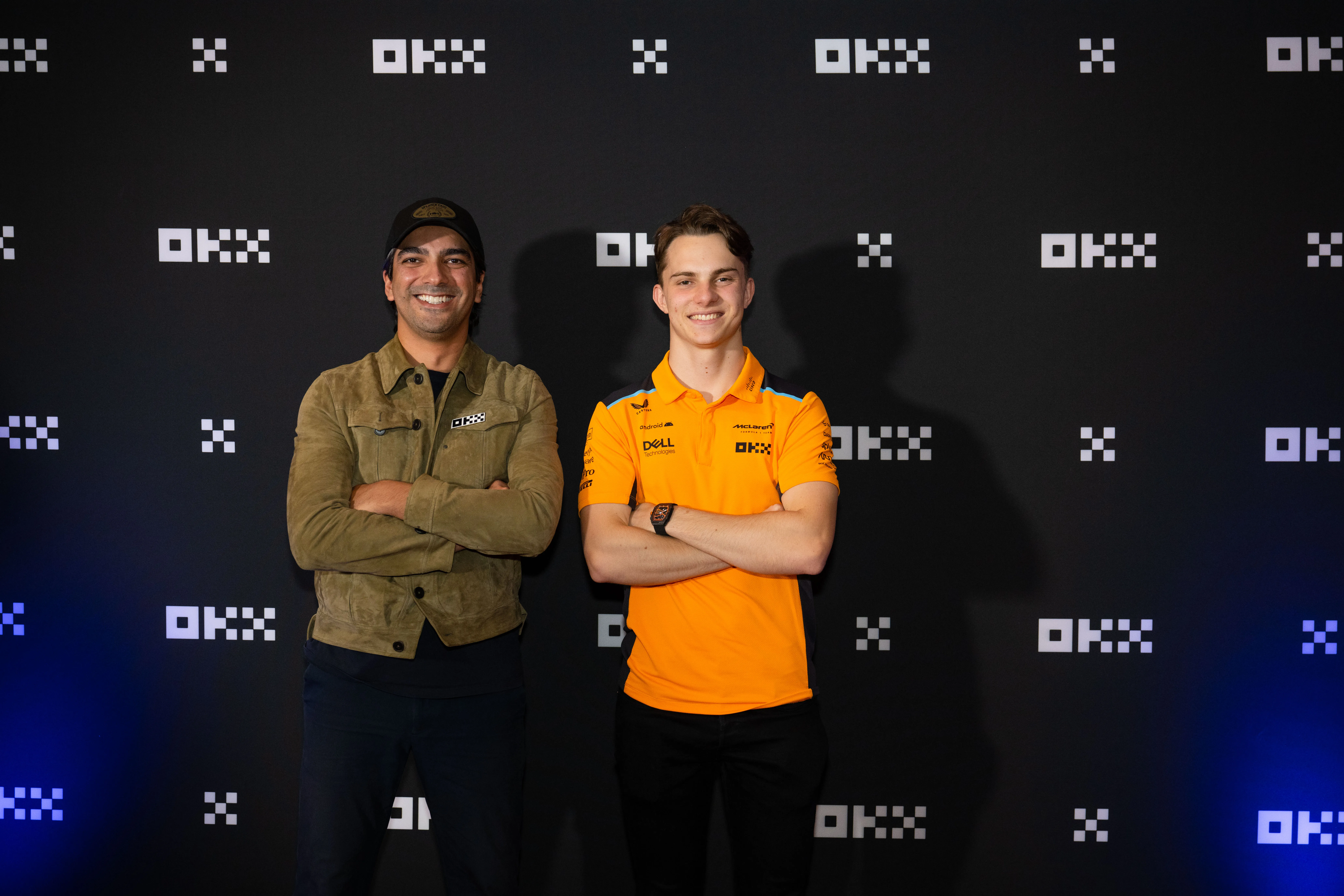 OKX CMO Haider Rafique (left) and McLaren F1 Driver Oscar Piastri (right)